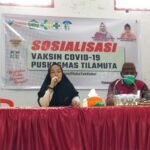 Kepala Puskemas Tilamuta Israhmawaty Saripi, A.md.Kes, saat melakukan sosialisasi vaksinasi Covid-19