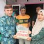 Bupati Pohuwato serahkan bantuan kepada masyarakat saat pencanangan RTPS2 di Desa Padengo, Duhiadaa