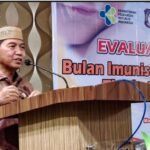 Sekda Darda Daraba memberikan sambutan Sekda Darda pada pada rapat evaluasi pelaksanaan Bulan Imunisasi Anak Nasional (BIAN) tingkat Provinsi Gorontalo, Kamis, 14 Juli, 2022.