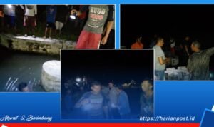 Anggota polsek Wonosari, di bantu aparat desa Harapan dan masyarakat mencari korban tenggelam di saluran irigasi desa Harapan, Kecamatan Wonosari