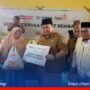Lembaga Zakat Infaq dan shadaqah Muhammadiyah (LAZISMU) Provinsi Gorontalo dan Kabupaten Boalemo menyerahkan bantuan paket sembako kepada korban banjir di Desa Mohungo Kecamatan Tilamuta