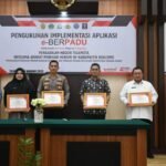Penjabat Bupati (Penjabup)Boalemo Hendriwan menghadiri pengukuhan Implementasi Aplikasi Elektronik Berkas Pidana Terpadu (e-BERPADU) bertempat di ruang sidang utama Pengadilan Negeri Tilamuta