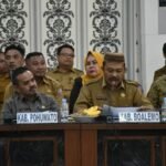 Sherman Moridu saat menghadiri rapat koordinasi dan evaluasi penyerapan Anggaran APBD dan APBN triwulan IV TA 2022 tingkat Provinsi Gorontalo,di aula Dulohupa Kantor Gubernur Gorontalo,
