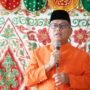 Bupati Gorontalo Utara Thariq Modanggu saat menghadiri perayaan ketupat di Masjid Al-Muqrrobin Desa Tombulilato