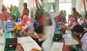 Imunisasi Siswa di SDN 7 Paguyaman oleh nakes Puskesmas Berlian