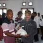 Penyerahan bantuan dari BAZNAS Boalemo oleh Penjabat Bupati Sherman Moridu
