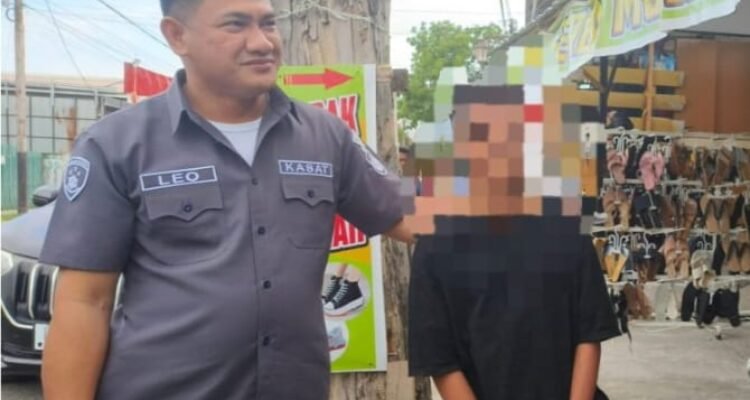 Pelaku penganiayaan seorang anak saat diamankan Polresta Gorontalo Kota