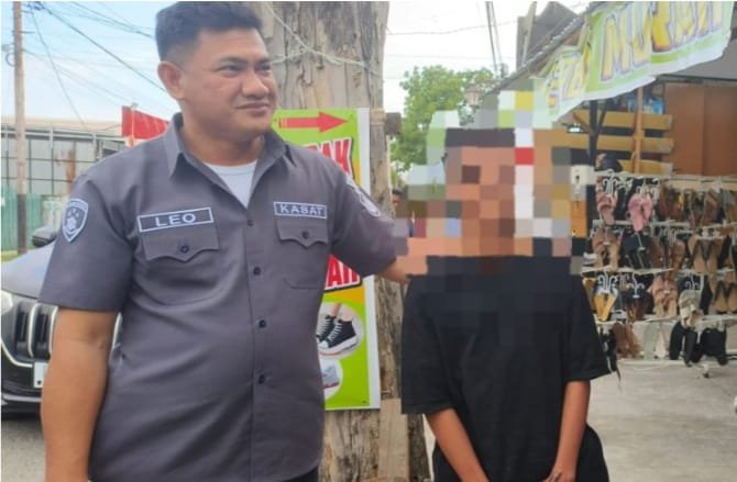 Pelaku penganiayaan seorang anak saat diamankan Polresta Gorontalo Kota