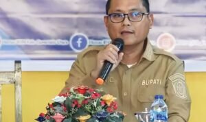 Bupati Thariq Modanggu saat menghadiri rapat Hibah Aset BMN dan BMD