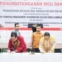 Bupati Gorontalo Utara Thariq Modanggu saat melakukan penandatanganan kerjasama dengan BPKP