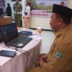 Penjabup Boalemo Sherman Moridu saat membuka Bimtek Aplikasi SIKS-NG secara Zoom Meeting