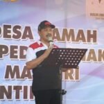 Penjabup Boalemo Sherman Moridu saat menghadiri peringatan Hari Jadi desa Modelomo, kecamatan Tilamuta