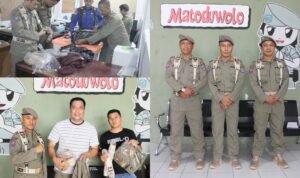 Kasatpol PP Masran Rauf Menyerahkan Pakaian Dinas Baru Kepada Personil Satpol PP