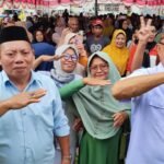 Ismet Mile - Risman Tolingguhu bersama masyarakat pendukung