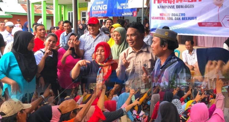 Antusias masyarakat Mananggu menyambut pasang Dedy Hamzah - Riko Djaini