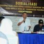Komisioner KPU Pohuwato Iskandar Ibrahim Berikan Sambutan pada sosialisasi Pilkada bersama Kepala Desa