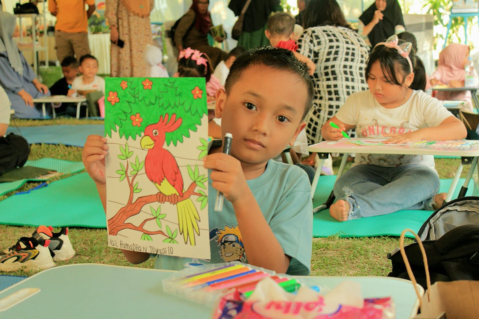 Adil Ramadhan Toadi, peserta mewarnai yang merupakan peserta didik kelas 1, Sekolah Dasar Negeri 1 Marisa