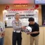 Jasa Raharja Gorontalo, Ditlantas Polda Gorontalo dan Badan Keuangan Provinsi Gorontalo bagikan helm Gratis Kepada Pengendara.