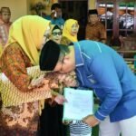 Wakil Bupati Boalemo, Lahmudin Hambali saat menghadiri pengukuhan PWRI Paguyaman