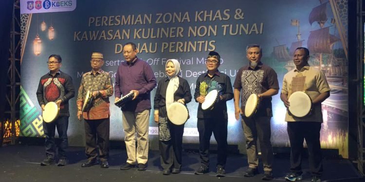 Bank Indonesia (BI) Perwakilan Provinsi Gorontalo bersama Komite Daerah Ekonomi dan Keuangan Syariah (KDEKS) Provinsi Gorontalo meresmikan Zona Kuliner Halal, Aman, dan Sehat (KHAS) serta Kawasan Kuliner Non Tunai di Danau Perintis, Suwawa, Bone Bolango