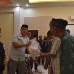 Wakil Bupati Boalemo, Lahmudin Hambali, mendampingi Wakil Gubernur Gorontalo dalam kegiatan pendistribusian Bantuan Langsung Pangan Pemerintah Provinsi Gorontalo