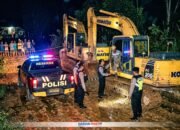 Ilustrasi Dugaan Polisi Amankan Dua Alat Berat Menuju PETI di Tangga Barito.