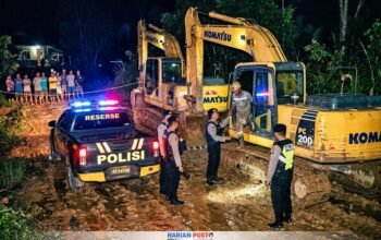 Ilustrasi Dugaan Polisi Amankan Dua Alat Berat Menuju PETI di Tangga Barito.