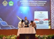 Penyerahan LHP LKPD Pemkab Boalemo 2025 oleh BPK Gorontalo. (Sumber Foto: Prokopim)