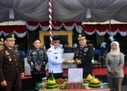 Wakil Bupati Boalemo, Lahmuddin Hambali, saat menghadiri Upacara Peringatan Hari Bhayangkara ke-80 di Halaman Mapolres Boalemo. (Sumber Foto: Prokopim/Arif)